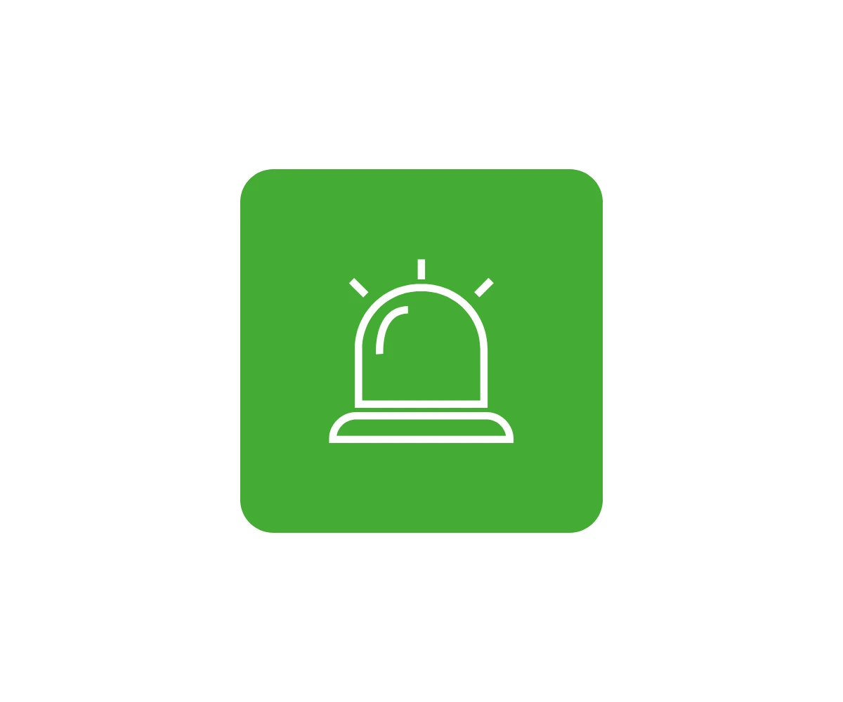 a green square with a white icon showing a security light